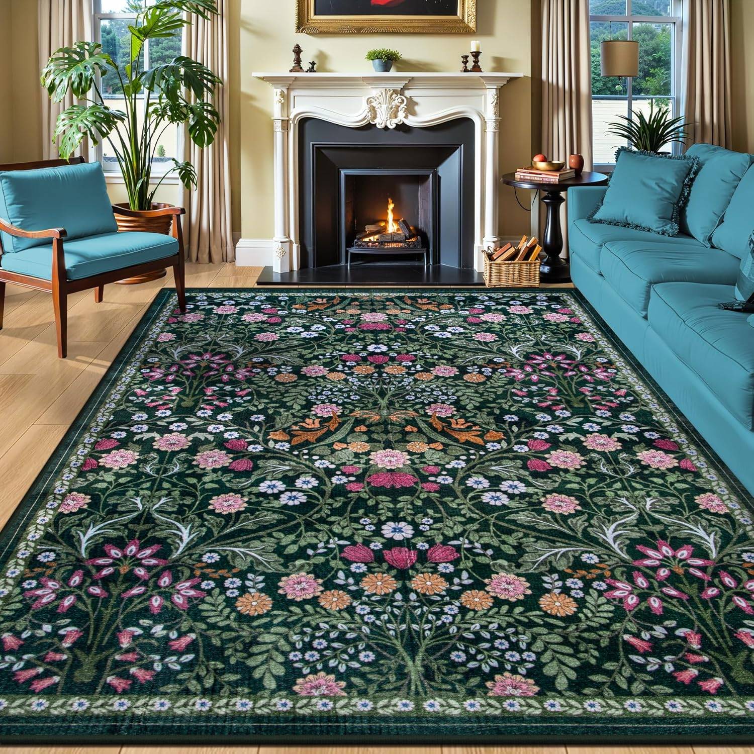 Dark green floral rug in a bright vintage living room with teal seating, cream fireplace, wood floors, plants, and warm cozy cottage style.